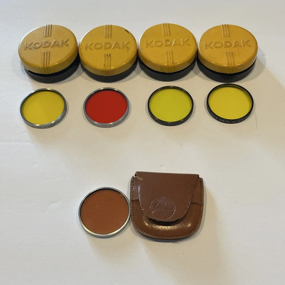 4 Kodak lens cases,3 Wratten lens, 1 Kodak lens and 1 Ednalite lens & pouch-used